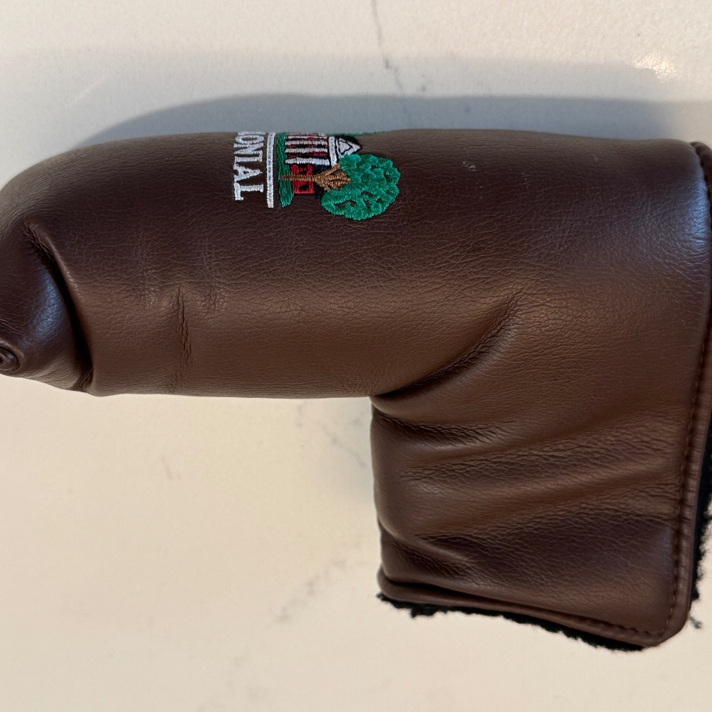Putter head cover with Colonial Country Club logo